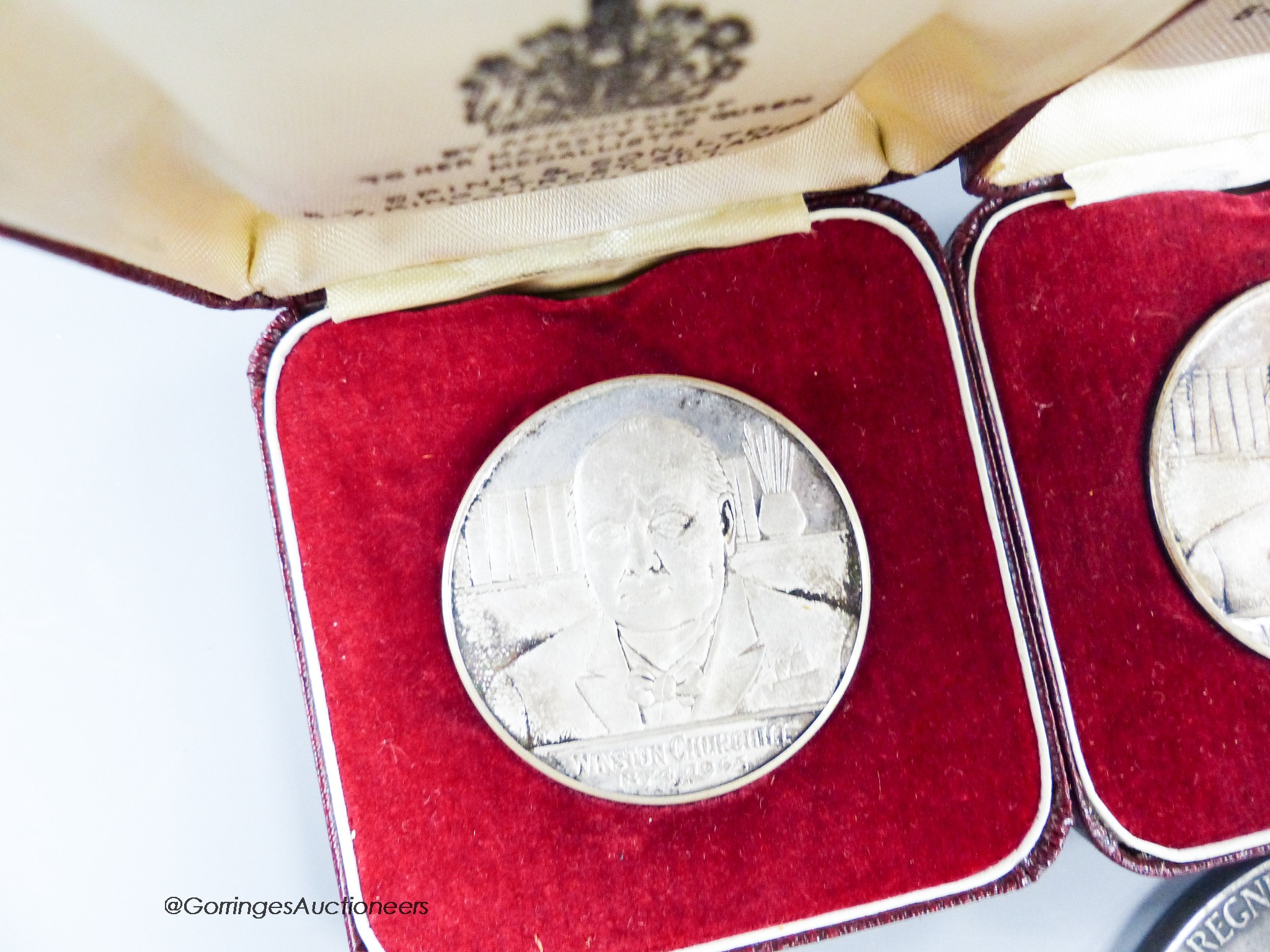 Two Churchill crowns and two silver medals